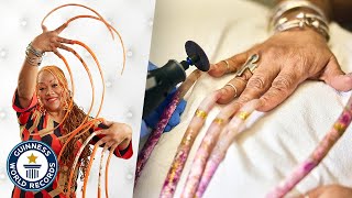 Cutting The Worlds Longest Fingernails  Guinness World Records [upl. by Inaj353]