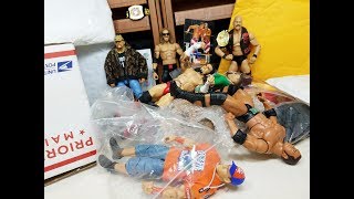 ENORMOUS UNBOXING OF RARE WWE FIGURES [upl. by Assiar]