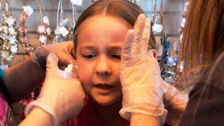 9 Year Old Gets Her Ears Pierced At Claires [upl. by Aicilas]