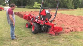 How To Plow With A SubcompactKubota BX Tractor [upl. by Tchao791]