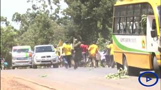 Teacher clobbers a police officer dispersing protest in Kericho [upl. by Imuya]