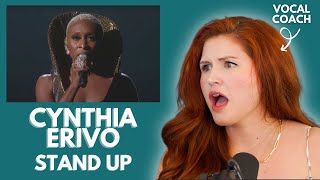 CYNTHIA ERIVO I quotStand Upquot I Vocal Coach Reacts [upl. by Jeana]