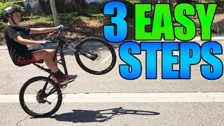 How to Wheelie a Mountain Bike  3 Easy Steps [upl. by Yrruc]