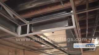 Installing Ceiling Drops For A Dropped or Suspended Ceiling [upl. by Anoved]