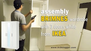 assembly BRIMNES wardrobe with 3 doors white from IKEA  th3 blogger [upl. by Ahsetra180]